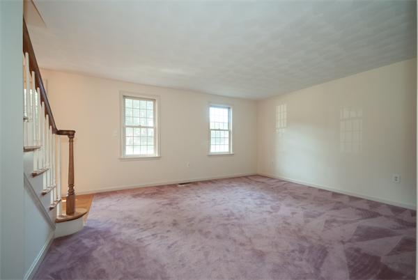 8 Aaron Drive Topsfield, MA 01983 - Photo 12 of 26 an empty room with windows