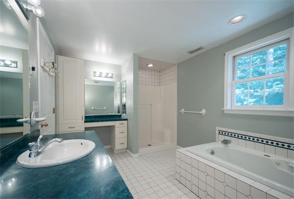 8 Aaron Drive Topsfield, MA 01983 - Photo 18 of 26 a bathroom with a sink double vanity granite tub and shower