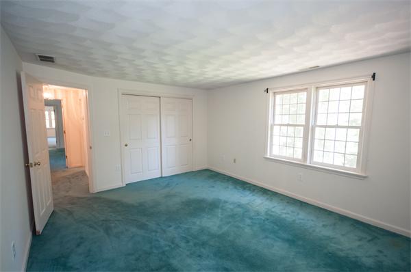 8 Aaron Drive Topsfield, MA 01983 - Photo 19 of 26 an empty room with windows