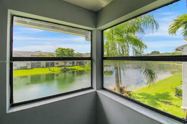 a view of swimming pool from a window
