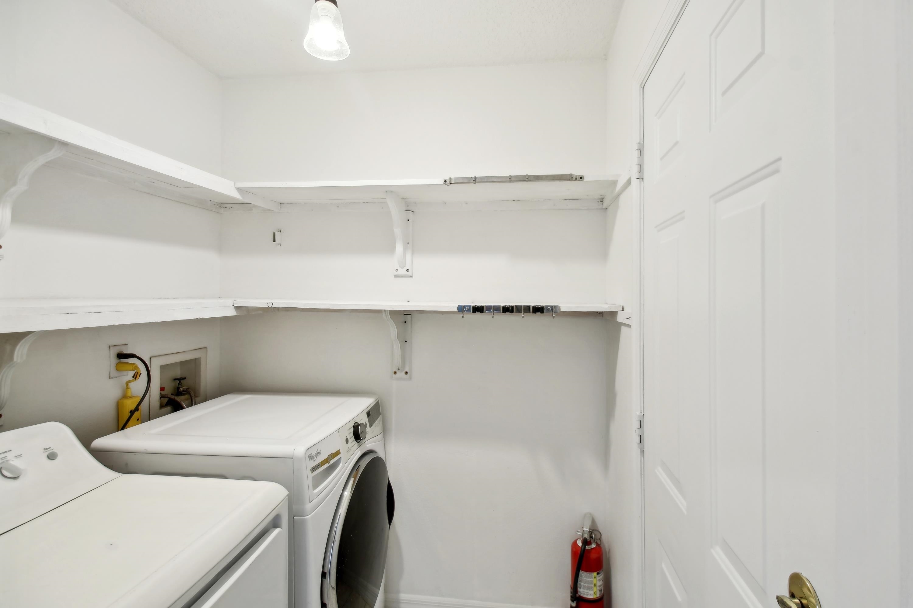 240 Jasmine Road St. Augustine, FL 32086 - Photo 27 of 30 a utility room with dryer and washer
