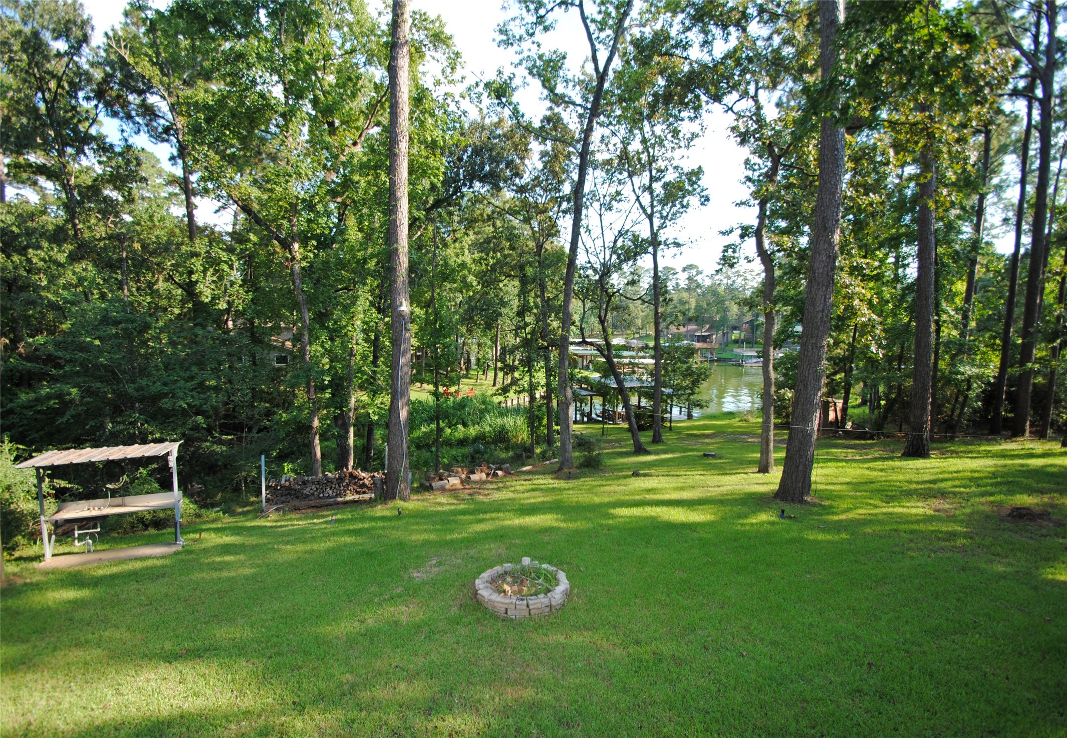 59 Paradise Loop Point Blank, TX 77364 - Photo 25 of 33 a garden view with a sitting space