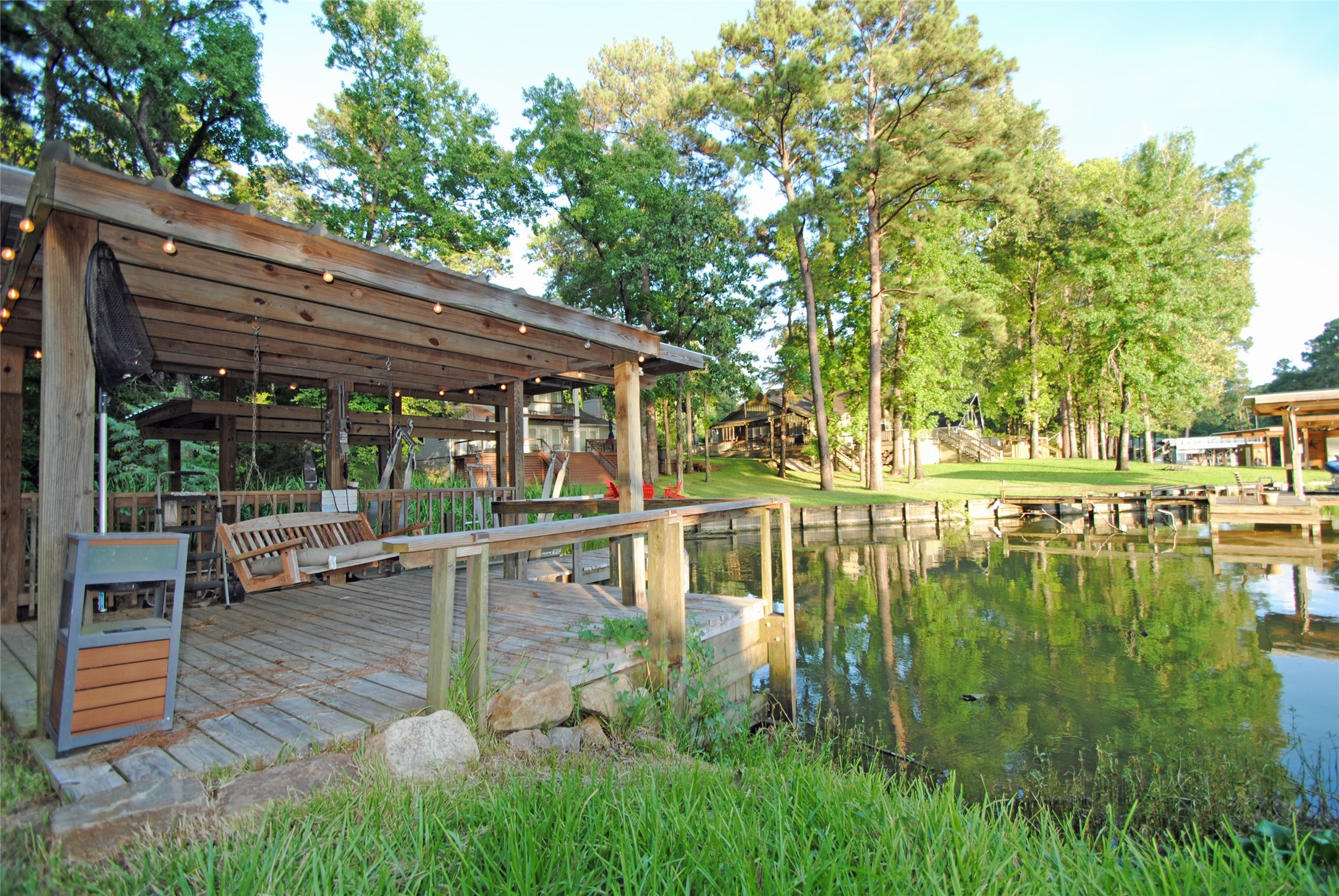 59 Paradise Loop Point Blank, TX 77364 - Photo 30 of 33 a view of house with backyard outdoor seating and green space