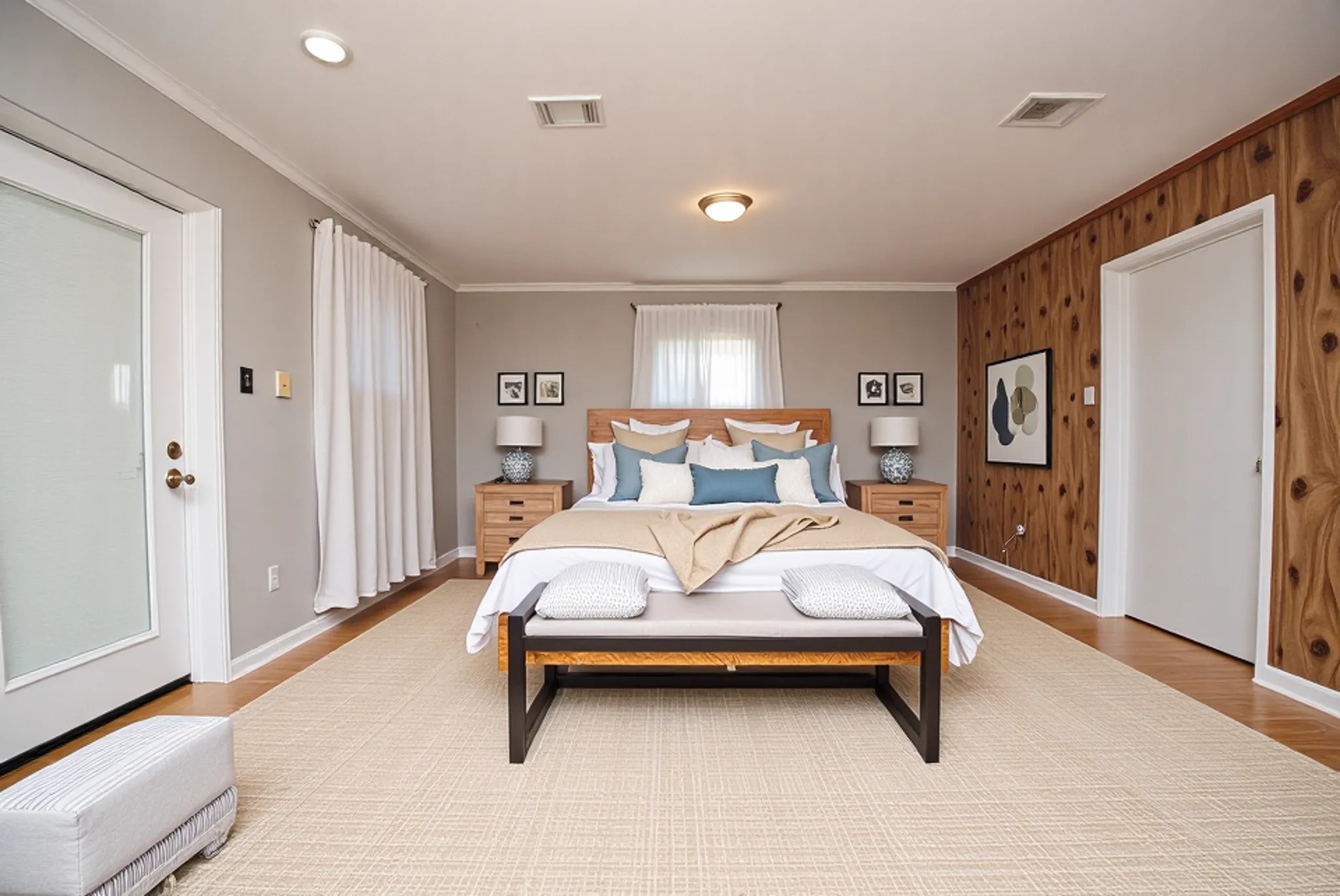 59 Paradise Loop Point Blank, TX 77364 - Photo 32 of 33 a bed sitting in a spacious bedroom next to a window and a larger closet