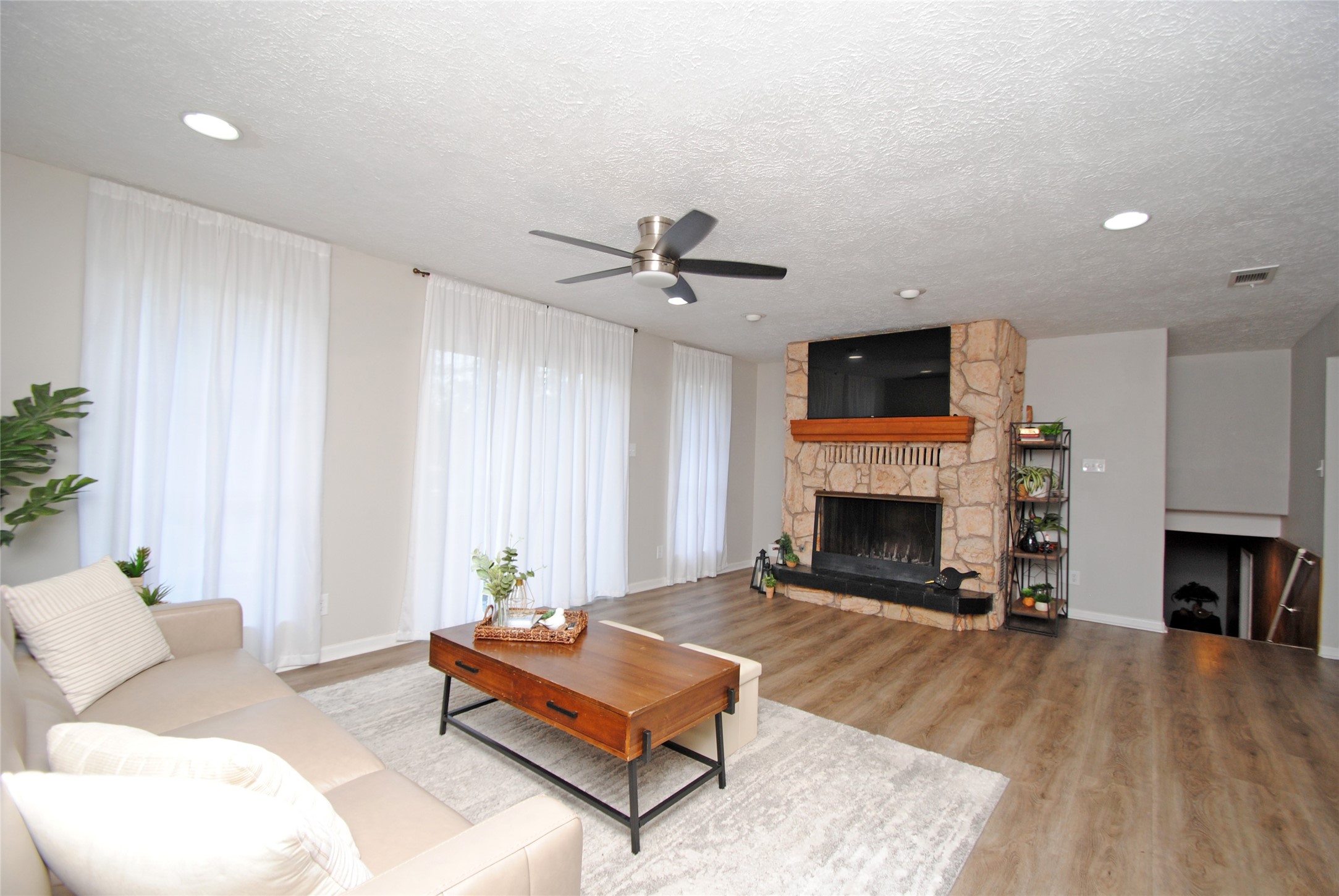 59 Paradise Loop Point Blank, TX 77364 - Photo 6 of 33 a living room with furniture fireplace and window