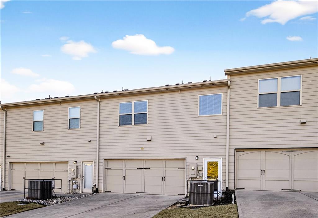 7789 Rutgers Circle Fairburn, GA 30213 - Photo 31 of 39 a view of a house with a patio