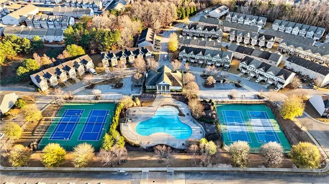 a view of a street with a building in the background