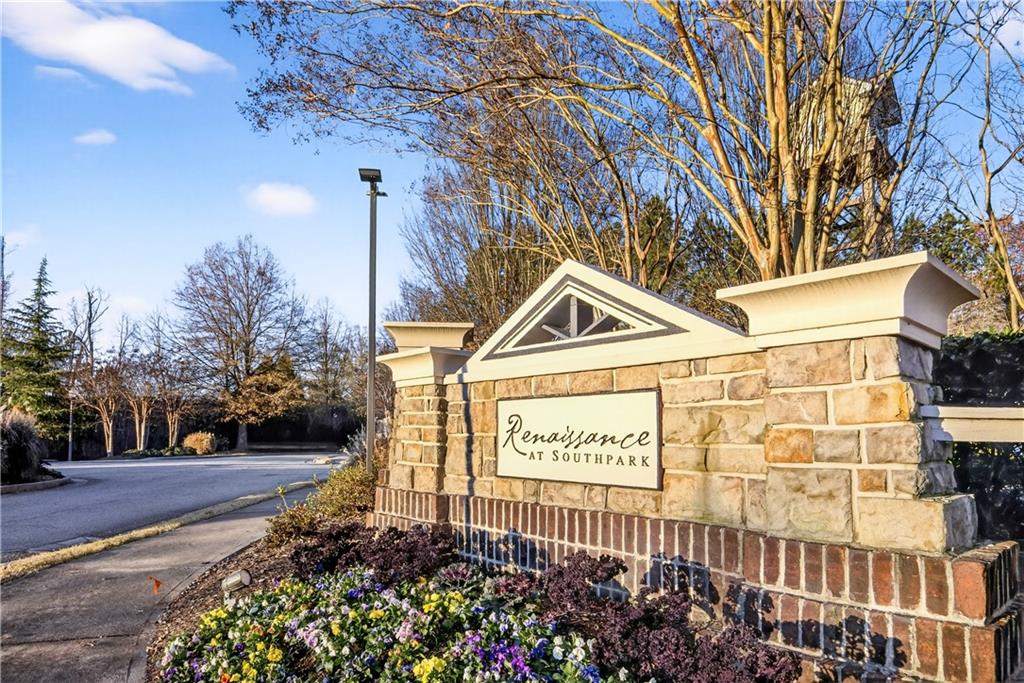 7789 Rutgers Circle Fairburn, GA 30213 - Photo 36 of 39 a view of a street with a building in the background