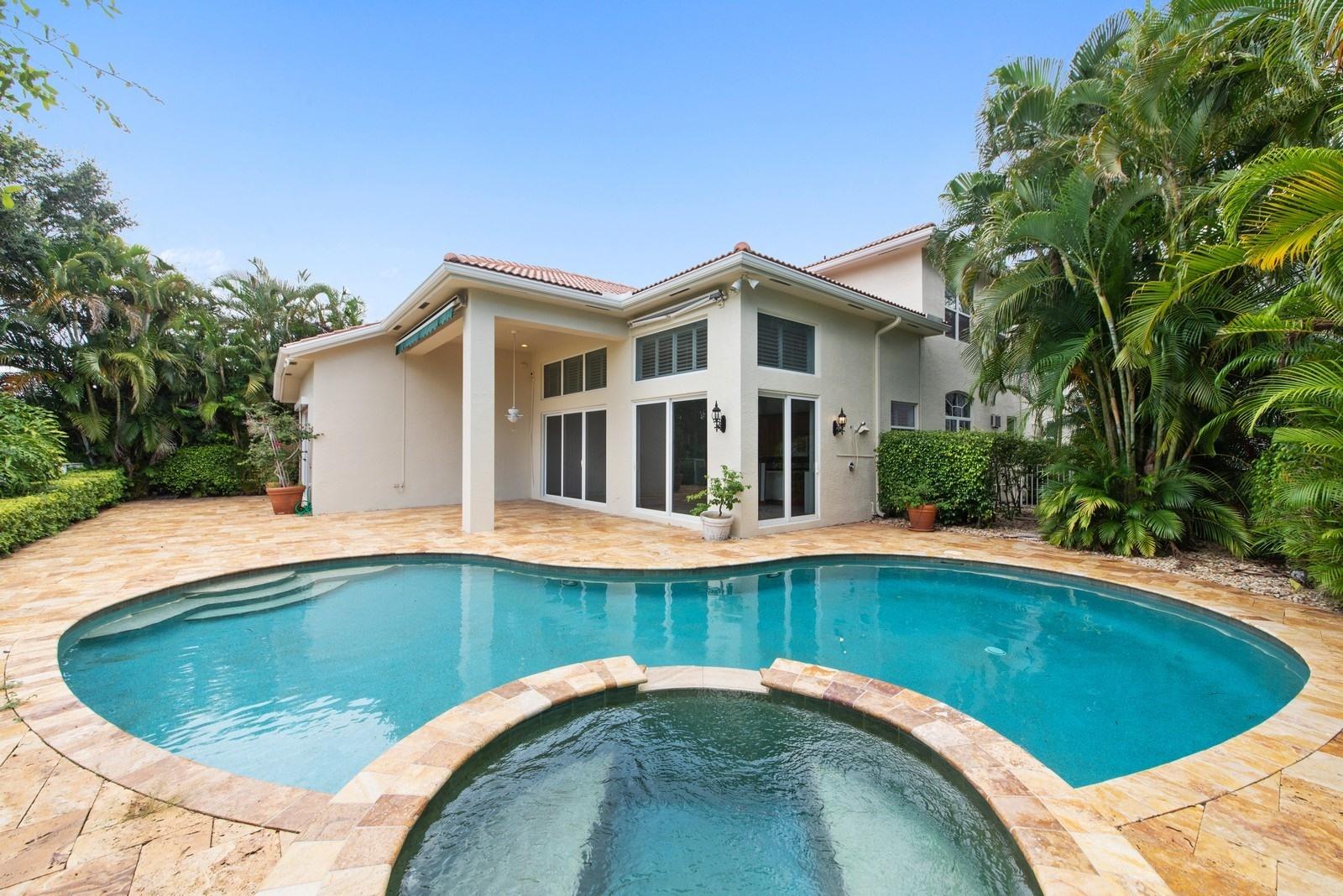 4116 Briarcliff Circle Boca Raton, FL 33496 - Photo 25 of 25 22_4116BriarcliffCircle_59_RearView_Cust