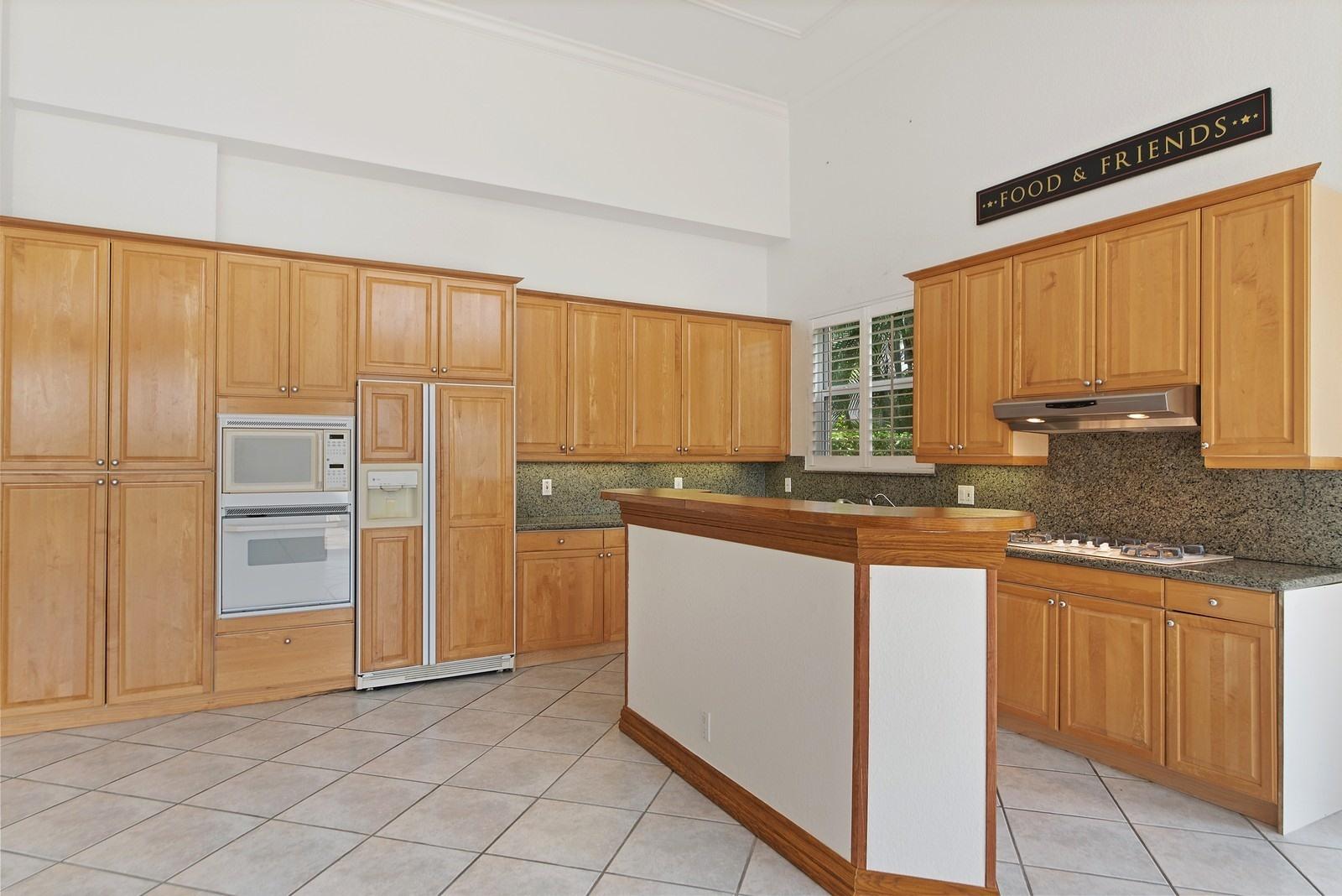4116 Briarcliff Circle Boca Raton, FL 33496 - Photo 5 of 25 04_4116BriarcliffCircle_5_Kitchen_Custom