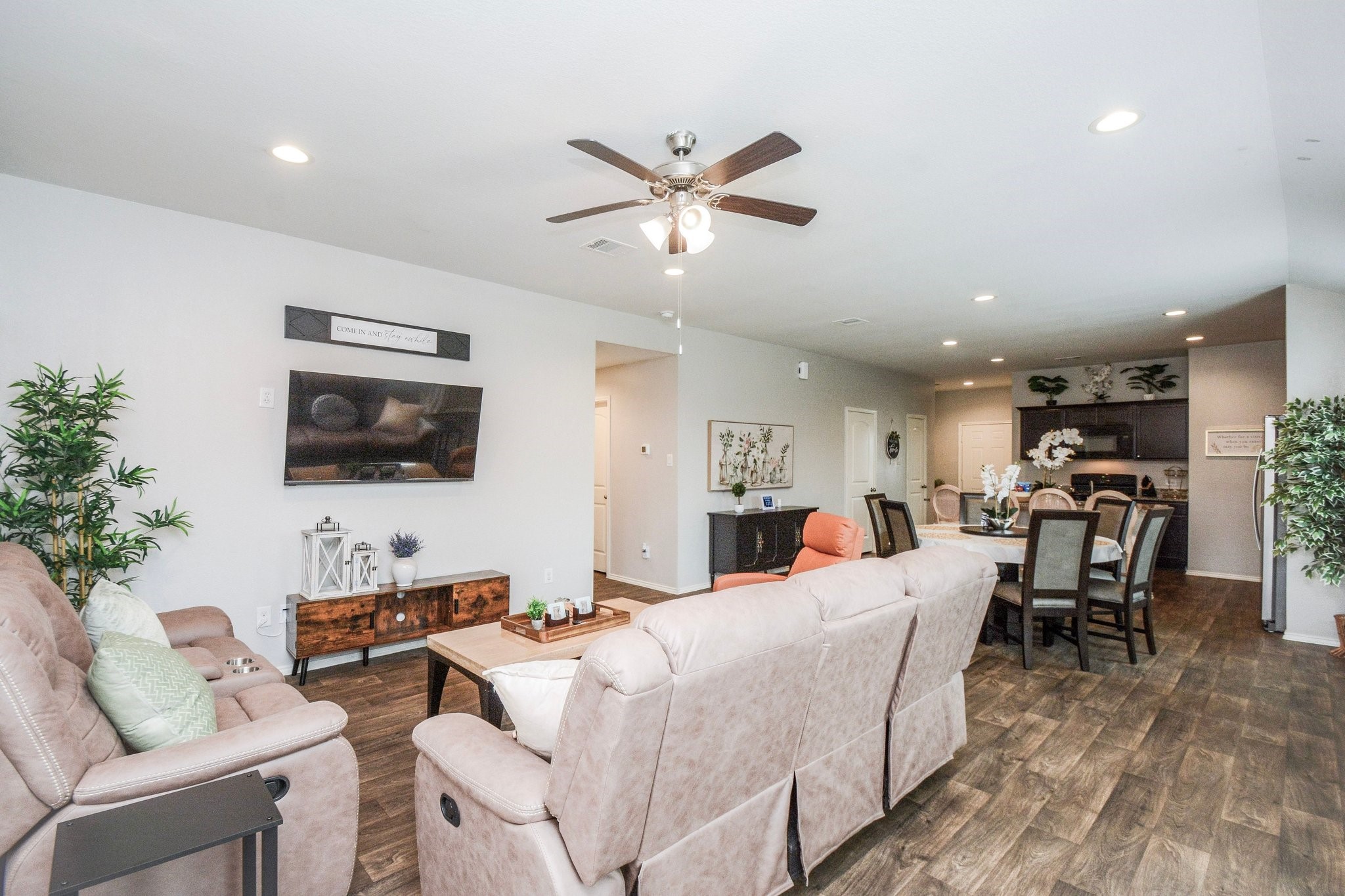23510 Harrow Fld Lane Spring, TX 77373 - Photo 3 of 18 a living room with furniture and a flat screen tv