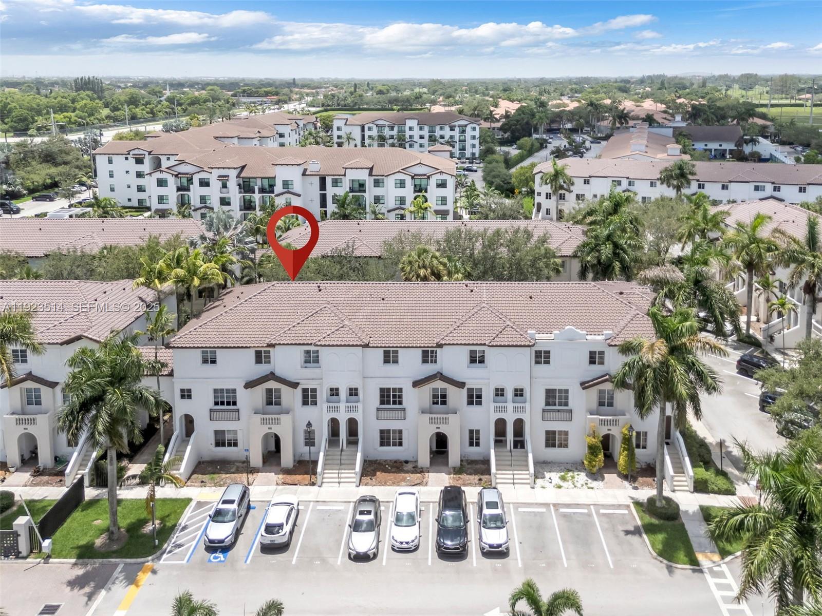 12430 Southwest 50th Street, Unit 109 Miramar, FL 33027 - Photo 26 of 28 an aerial view of multiple house