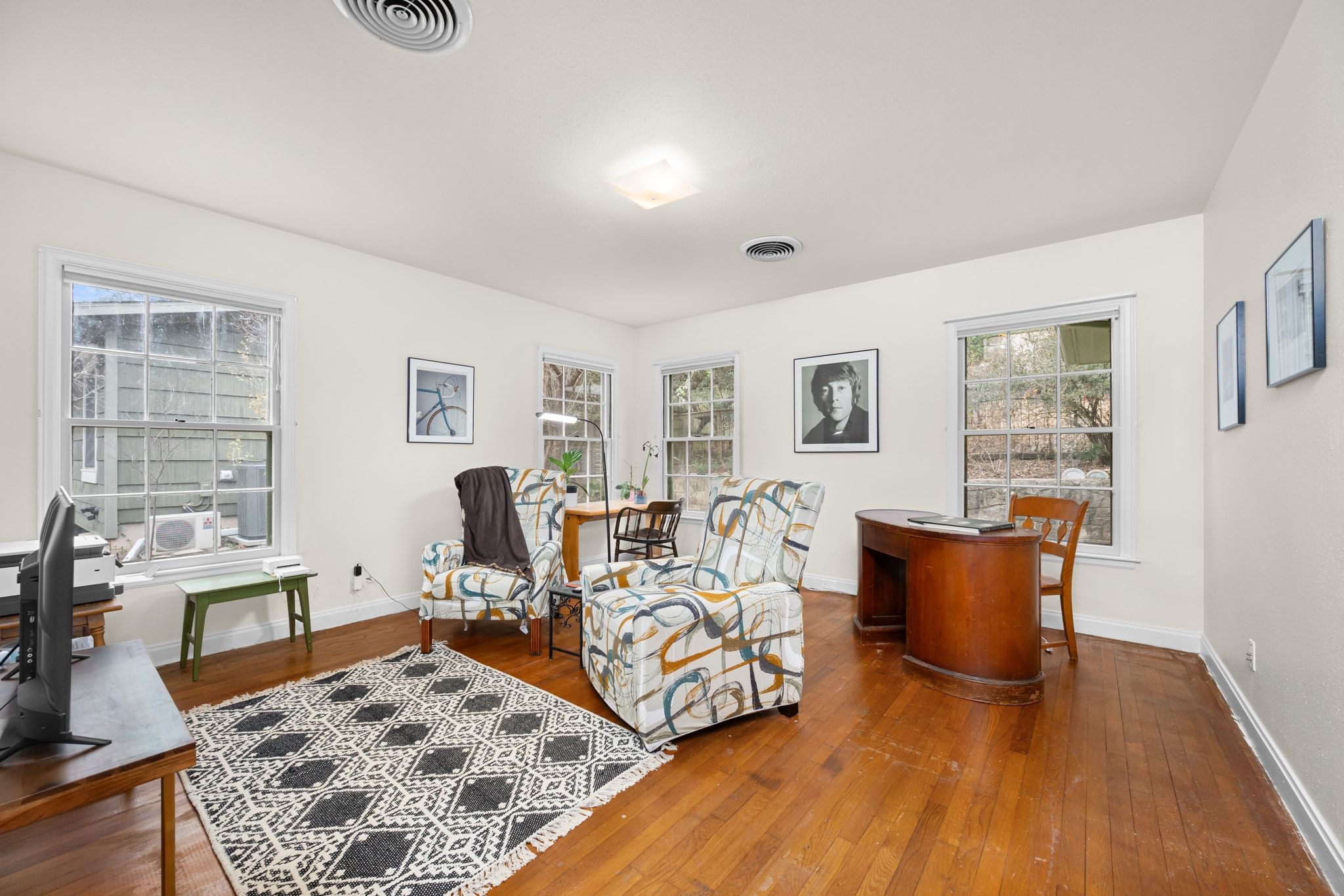 4804 Balcones Drive Austin, TX 78731 - Photo 18 of 27 a living room with furniture and wooden floor