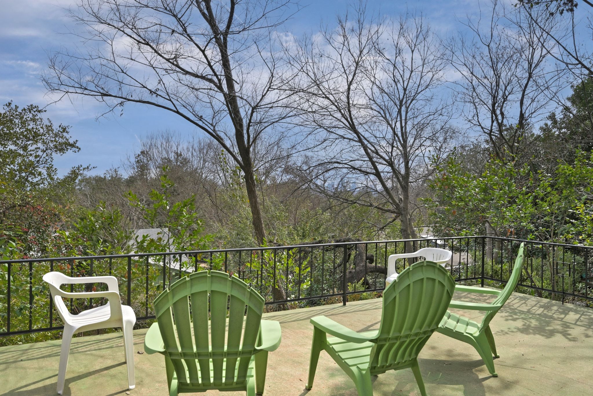 4804 Balcones Drive Austin, TX 78731 - Photo 23 of 27 a view of a chair and tables in the deck