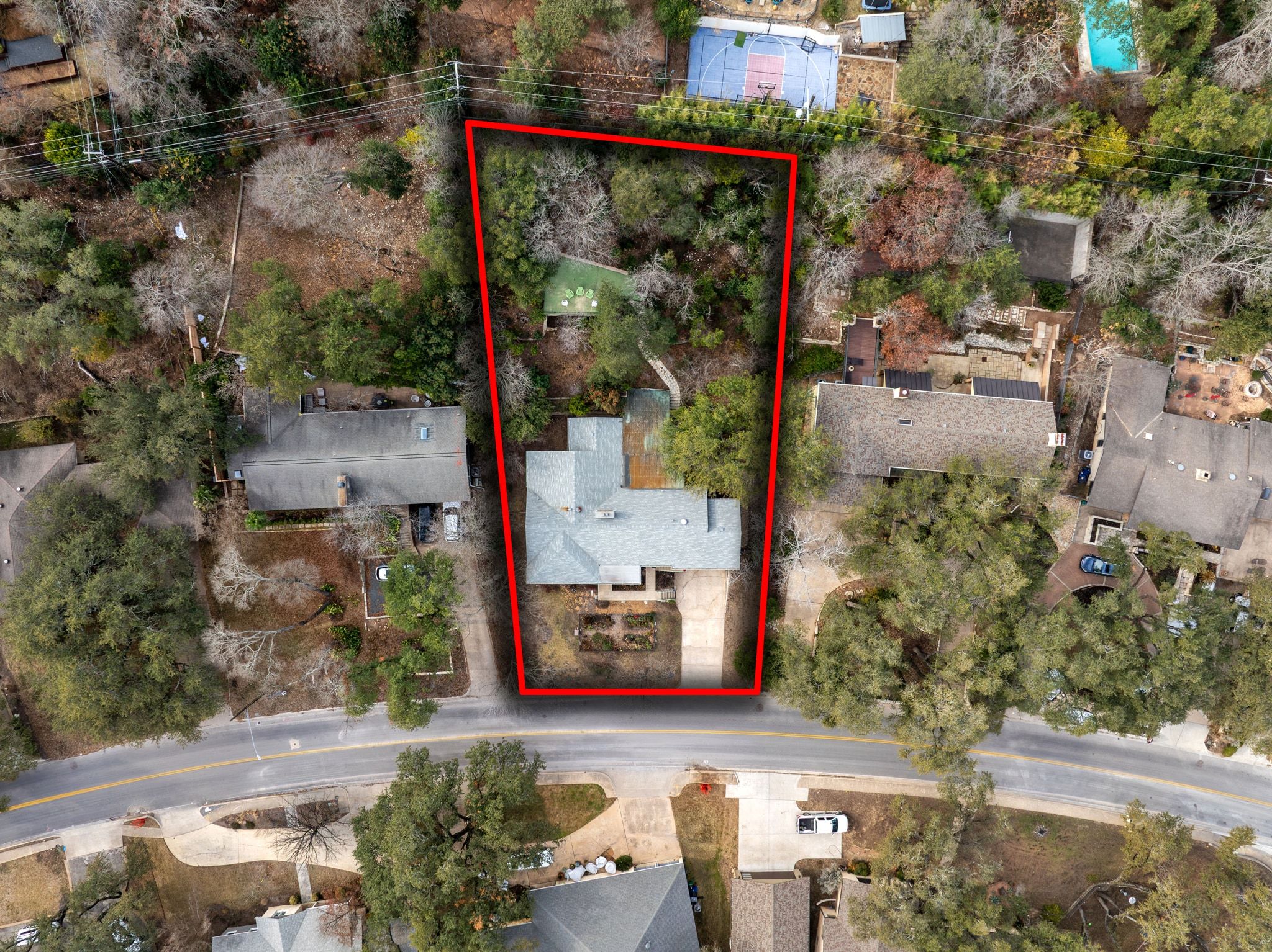 4804 Balcones Drive Austin, TX 78731 - Photo 24 of 27 a street view with tall buildings