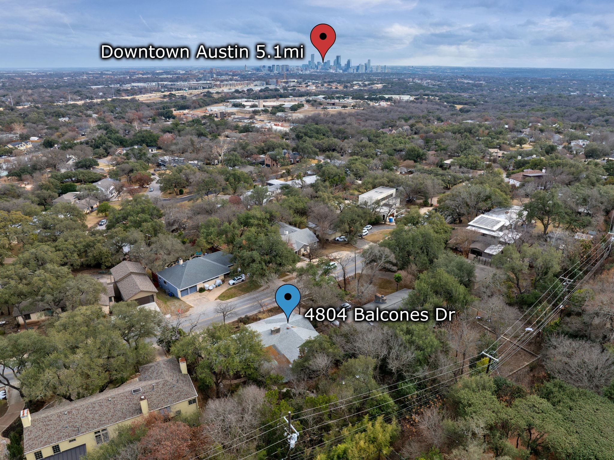 4804 Balcones Drive Austin, TX 78731 - Photo 26 of 27 an aerial view of a red and white house in a field