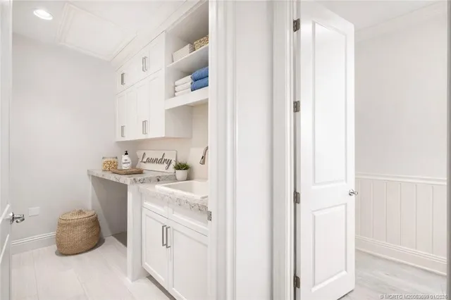 a bedroom with a large bed and a large window