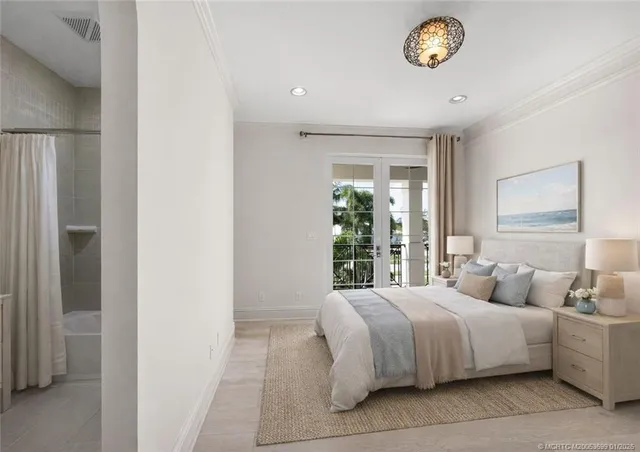 a view of a house with a yard and palm trees