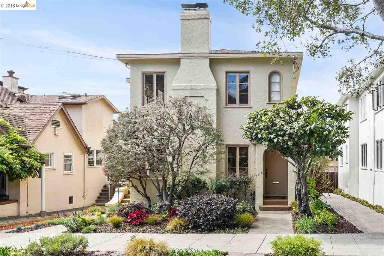 1518 Arch Street Berkeley, CA 94708 - Photo 1 of 1 a front view of a house with a yard and potted plants