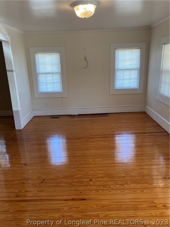 123 Smith Mill Road Lumberton, NC 28358 - Photo 3 of 17 a view of room with hardwood floor and window