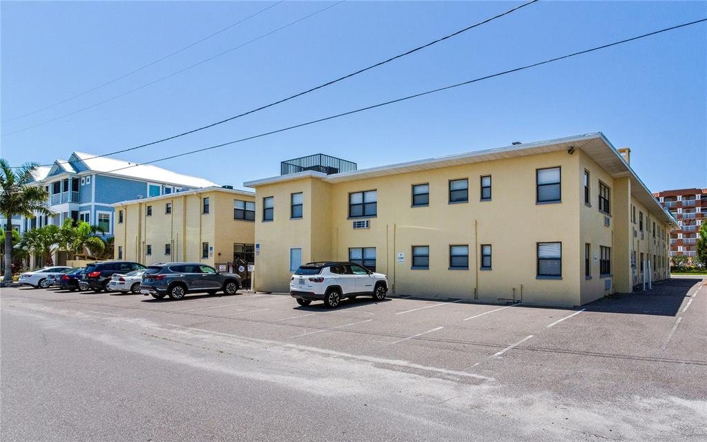 16333 Gulf Boulevard, Unit 113 Redington Beach, FL 33708 - Photo 39 of 40 a view of a car park in front of house