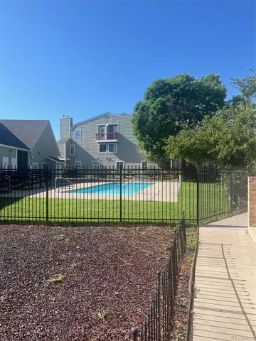a view of street along with a small yard