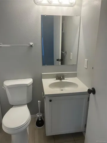 a bathroom with a sink and a toilet