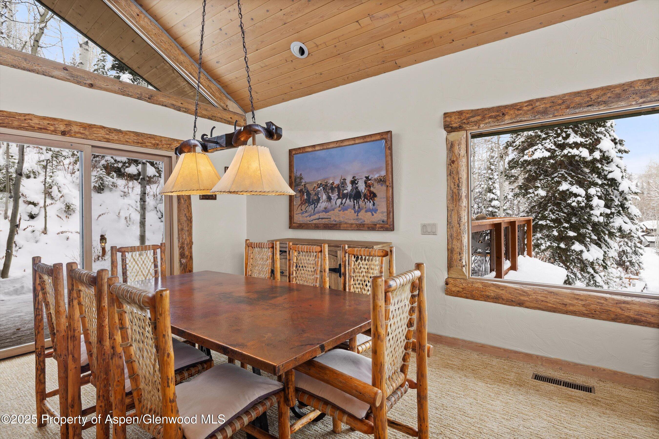 818 Faraway Road Snowmass Village, CO 81615 - Photo 3 of 24 a dining room with furniture and window