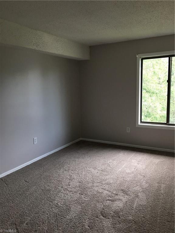 1700 North Hamilton Street, Unit G High Point, NC 27262 - Photo 10 of 16 2nd Bedroom w/NEW Carpet Fresh Paint