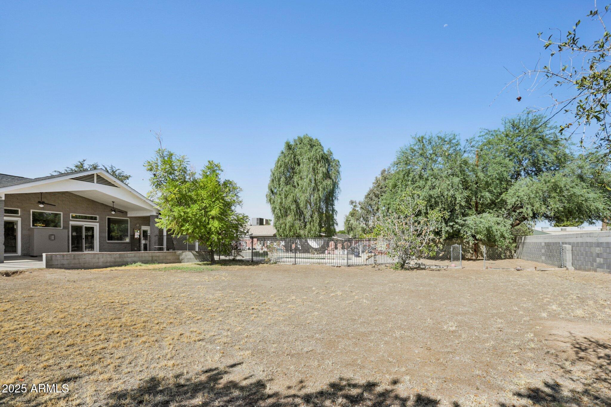 702 West Why Worry Lane Phoenix, AZ 85021 - Photo 43 of 46 a view of a house with a outdoor space