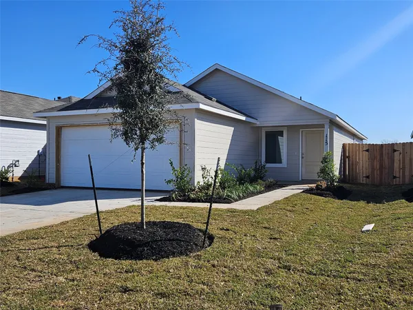 a house view with a garden space