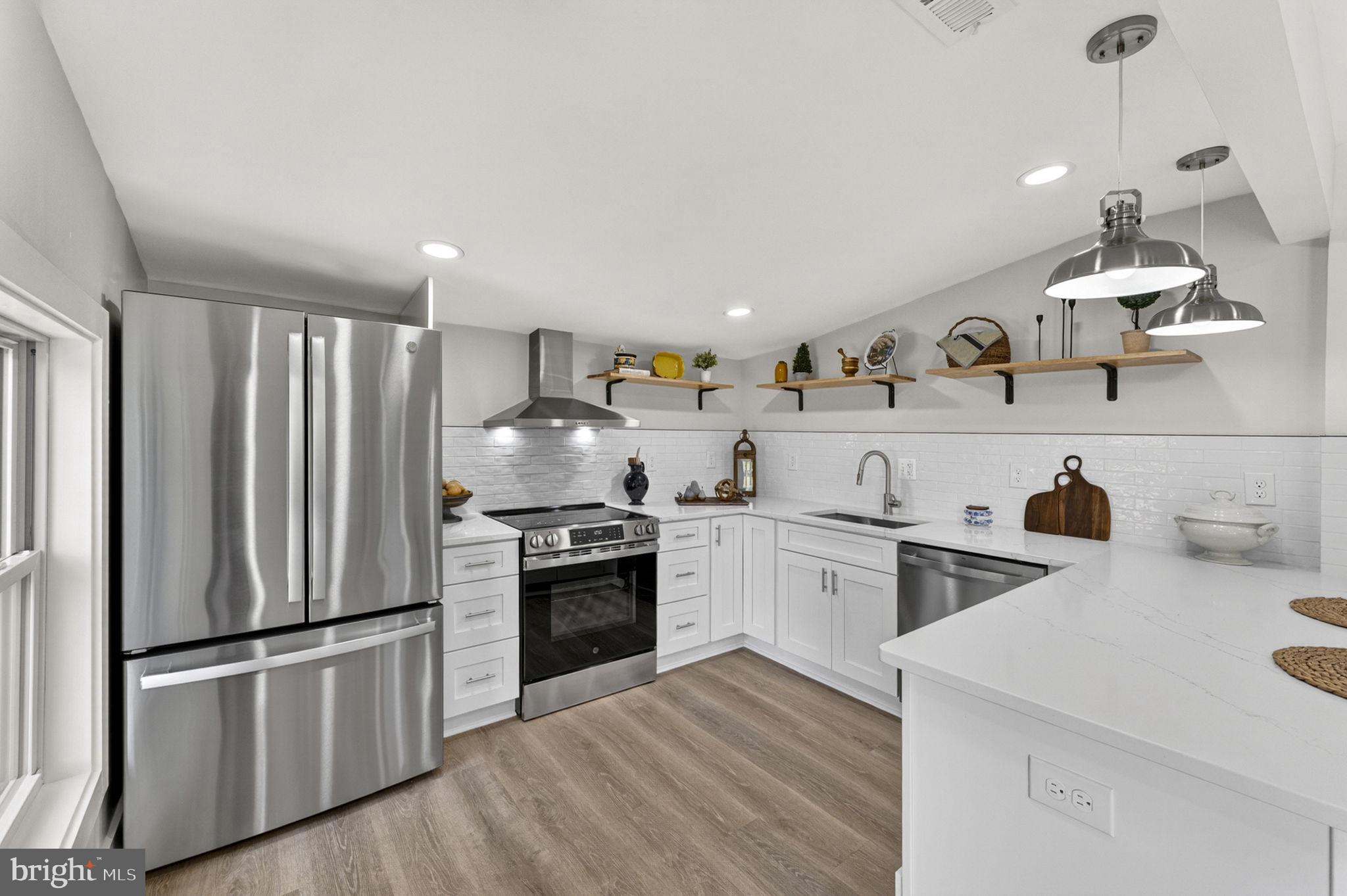33960 Welbourne Road Upperville, VA 20184 - Photo 12 of 43 Sleek modern kitchen with stylish finishes.