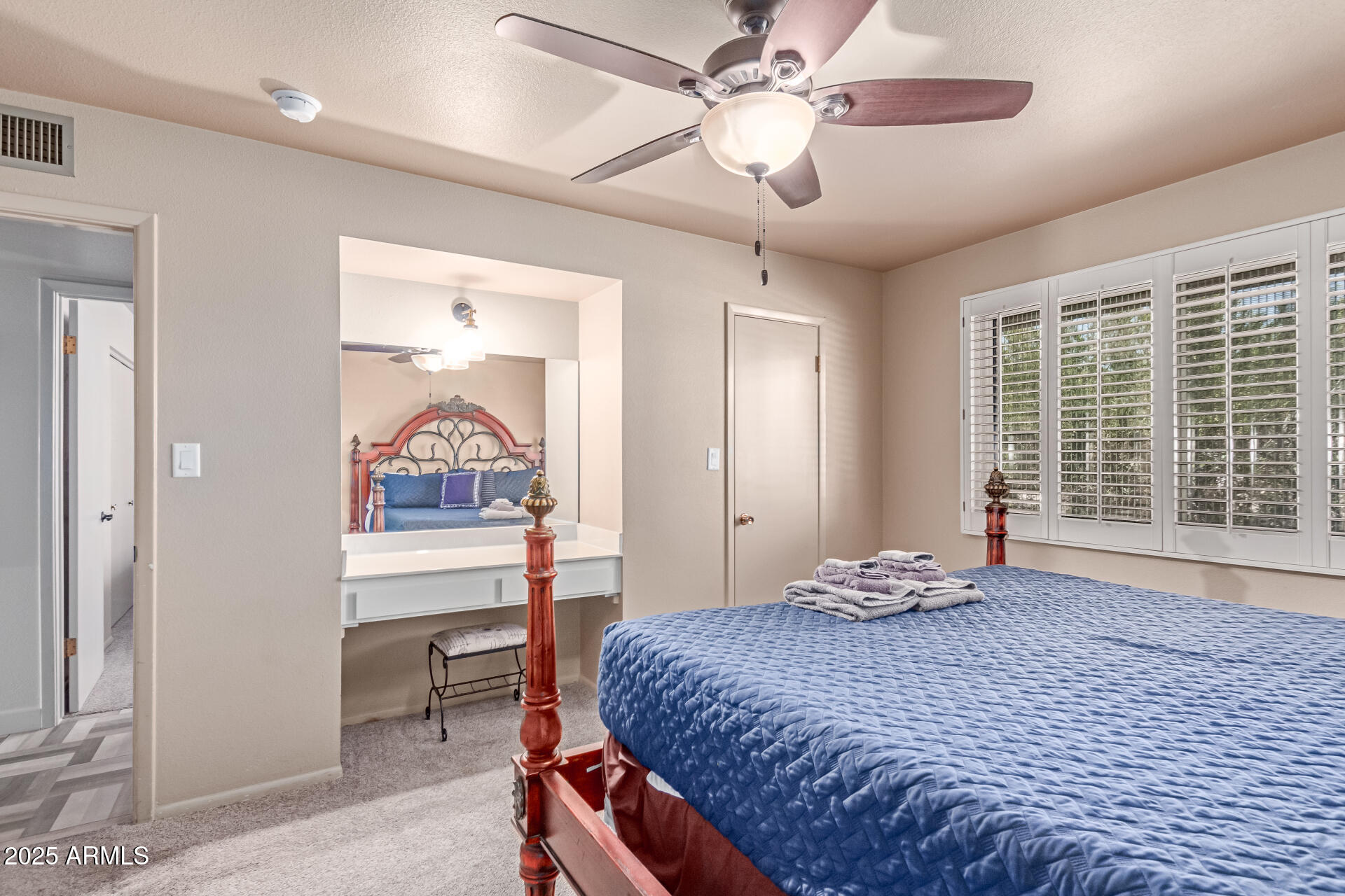 2716 South Terrace Road Tempe, AZ 85282 - Photo 14 of 32 a bedroom with a large bed and a window