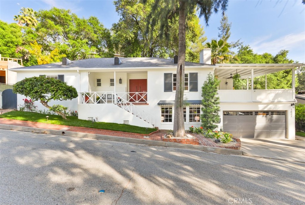 1632 Moreno Drive Glendale, CA 91207 - Photo 1 of 44 front view of a house with a street