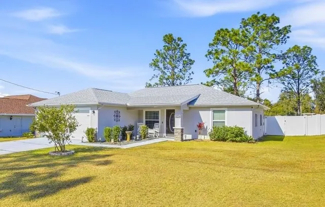 a view of a house with a swimming pool