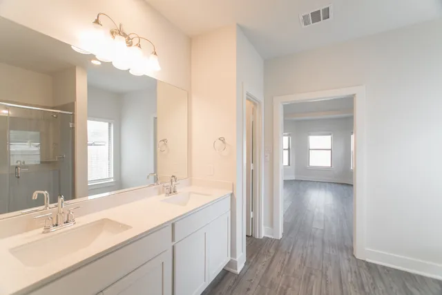 a bathroom with a toilet a sink and a bathtub