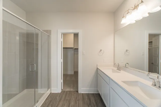 a view of an house with backyard space and balcony