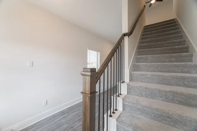 a view of kitchen with sink microwave and stove