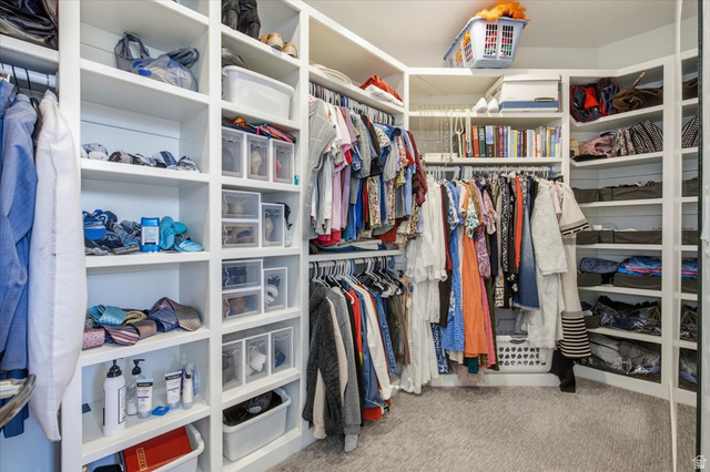 21 Pier Place Tooele, UT 84074 - Photo 38 of 112 Custom closet system featuring extensive shelving and hanging storage