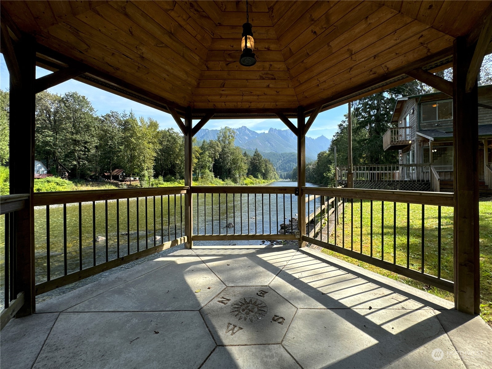 51603 South Riverside Road Gold Bar, WA 98251 - Photo 35 of 38 a view of balcony with wooden floor