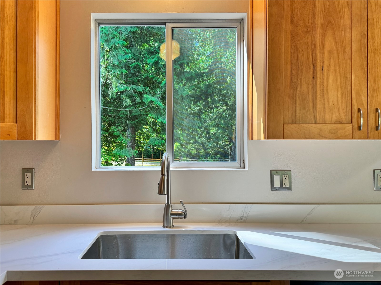 51603 South Riverside Road Gold Bar, WA 98251 - Photo 10 of 38 a kitchen with a sink and a window