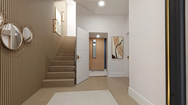 a view of hallway with stairs and wooden floor