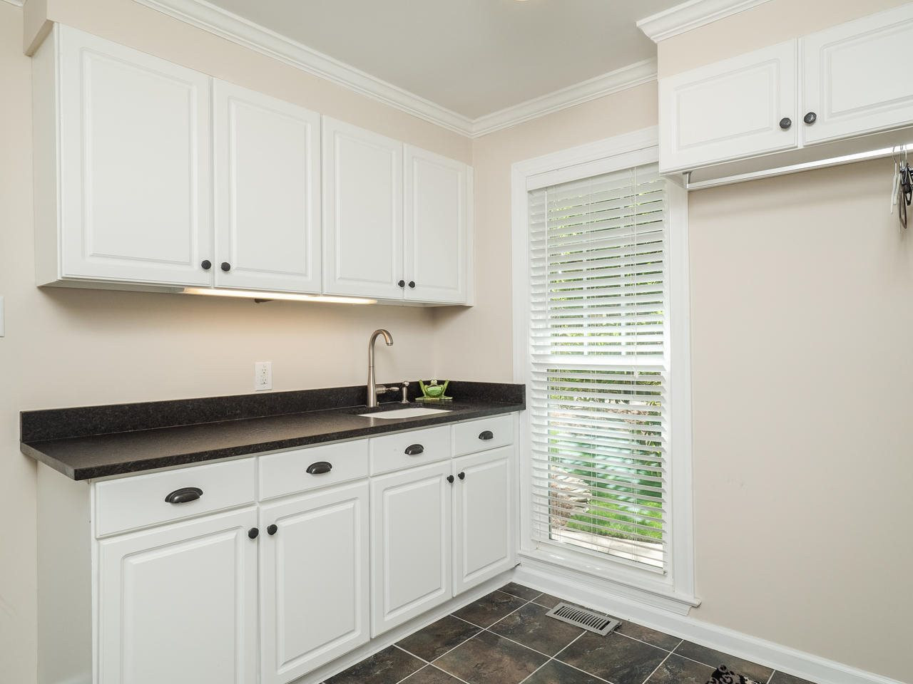 12329 Chastain Drive Raleigh, NC 27614 - Photo 15 of 30 Laundry Room w/leather finish granite & sink
