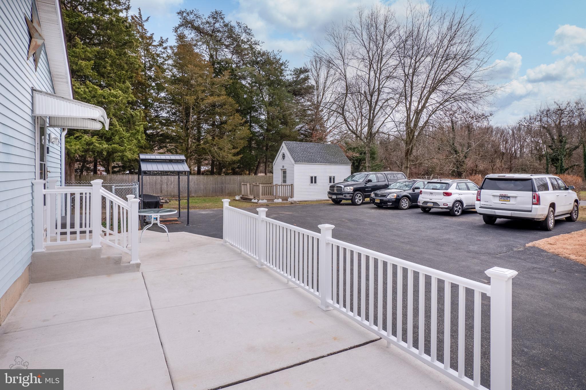 485 South Burlington Road Bridgeton, NJ 08302 - Photo 4 of 39 Expanded concrete patio, front and side of house.