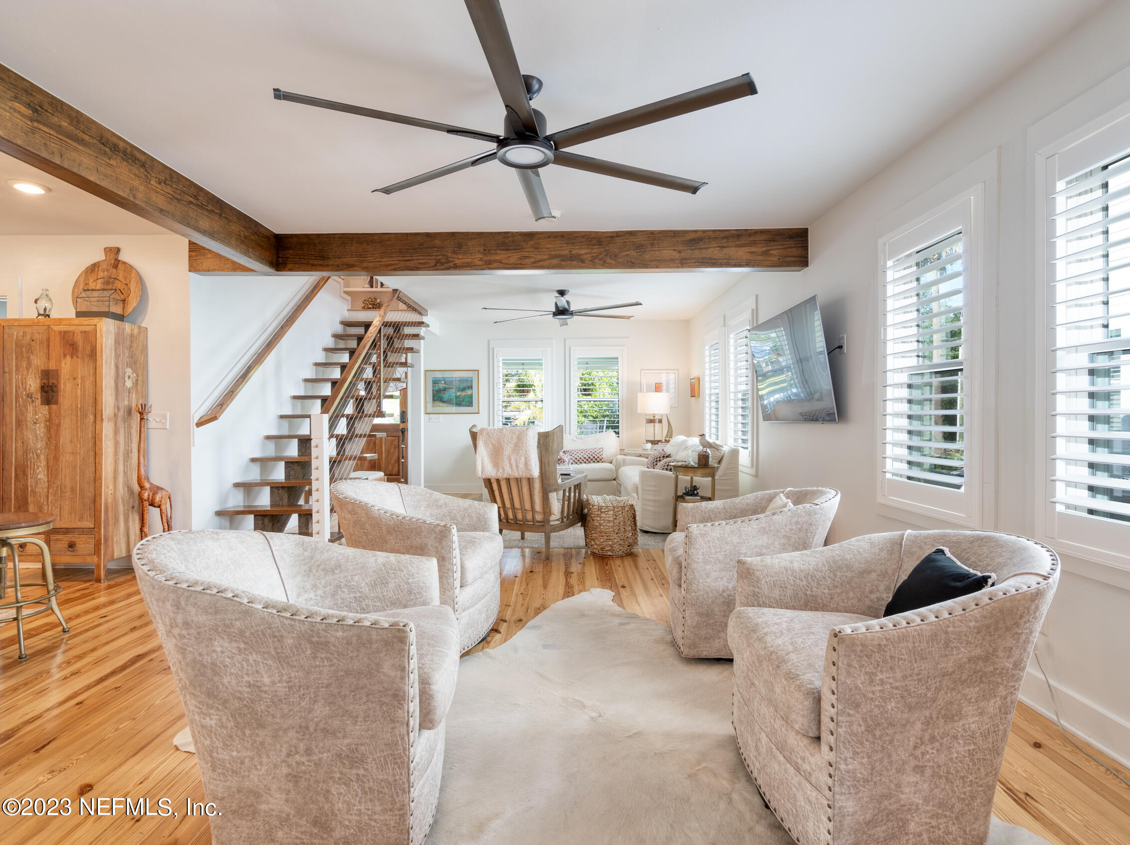 124 South 5th Street Fernandina Beach, FL 32034 - Photo 12 of 60 a living room with furniture and a large window