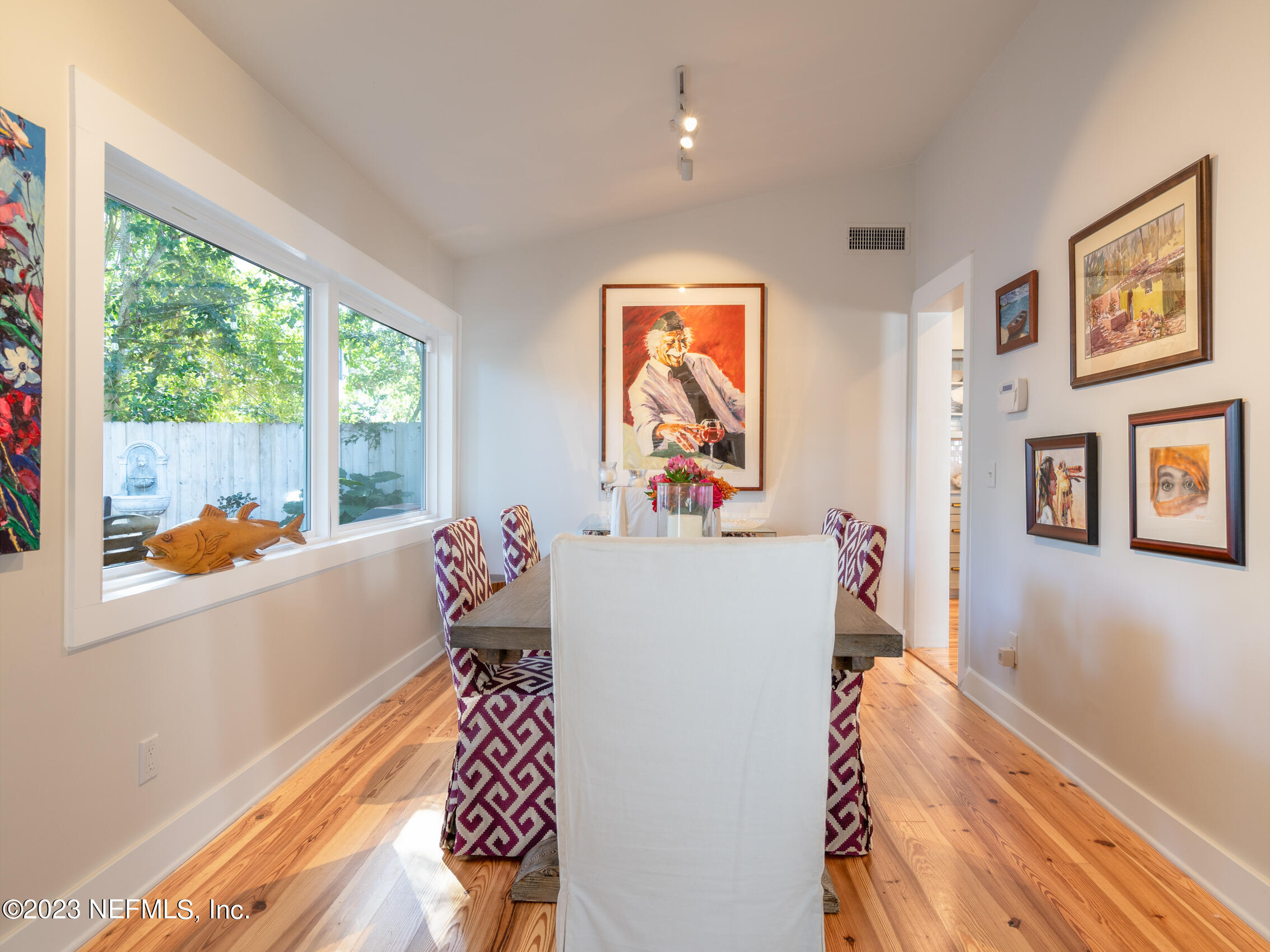 124 South 5th Street Fernandina Beach, FL 32034 - Photo 19 of 60 a living room with furniture and a window