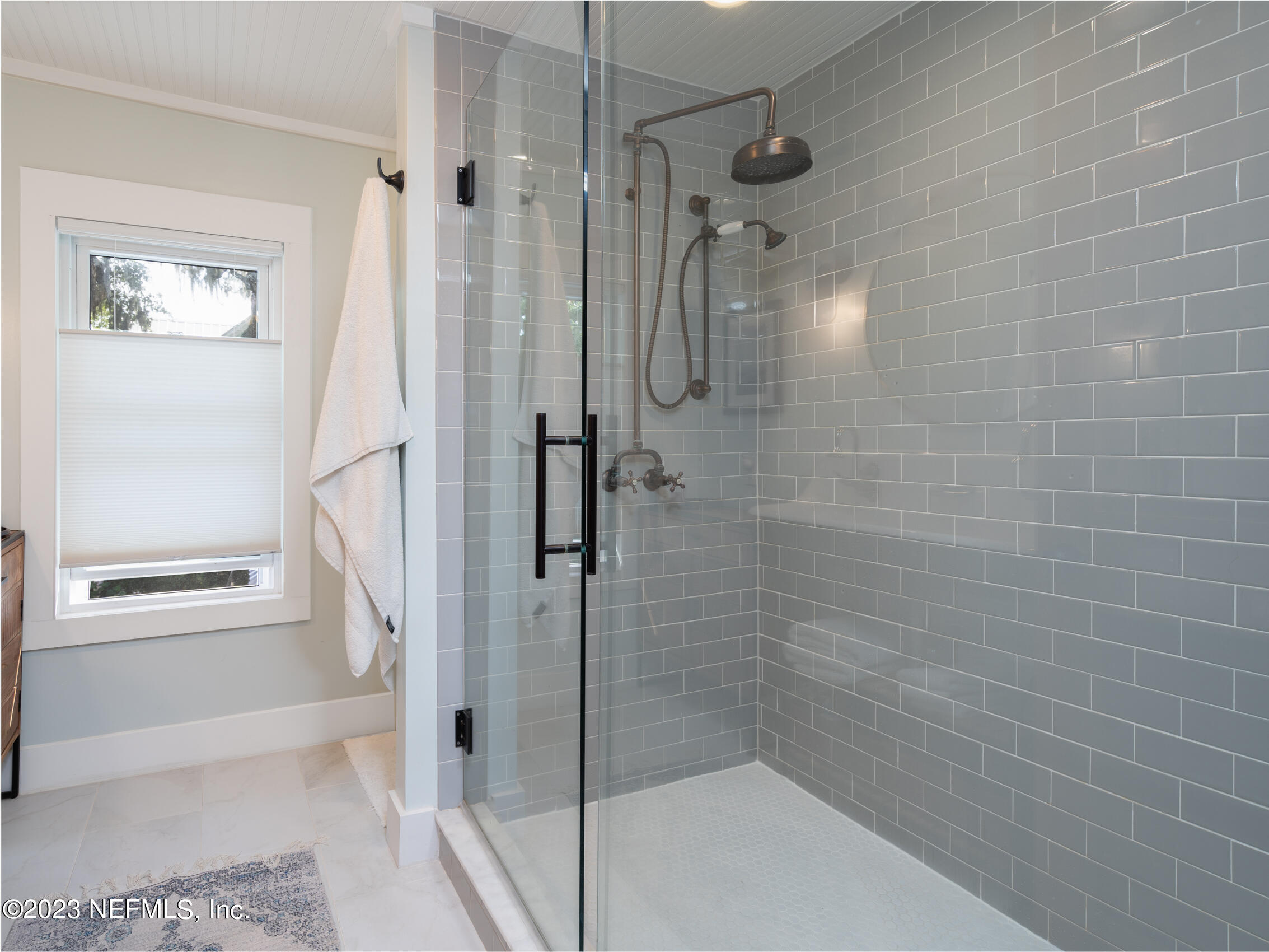 124 South 5th Street Fernandina Beach, FL 32034 - Photo 29 of 60 a bathroom with a shower