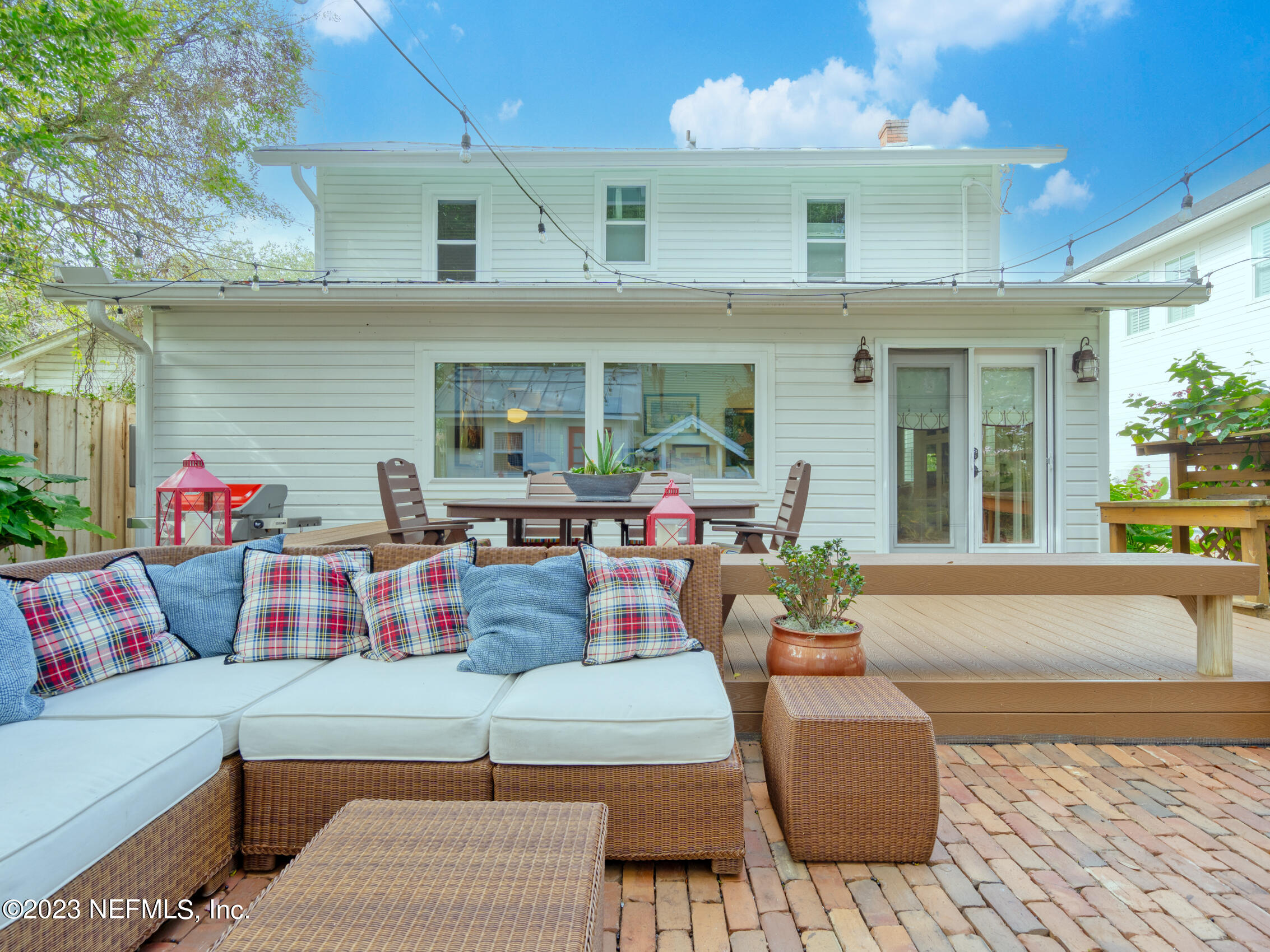 124 South 5th Street Fernandina Beach, FL 32034 - Photo 44 of 60 a view of a patio with couches and potted plant