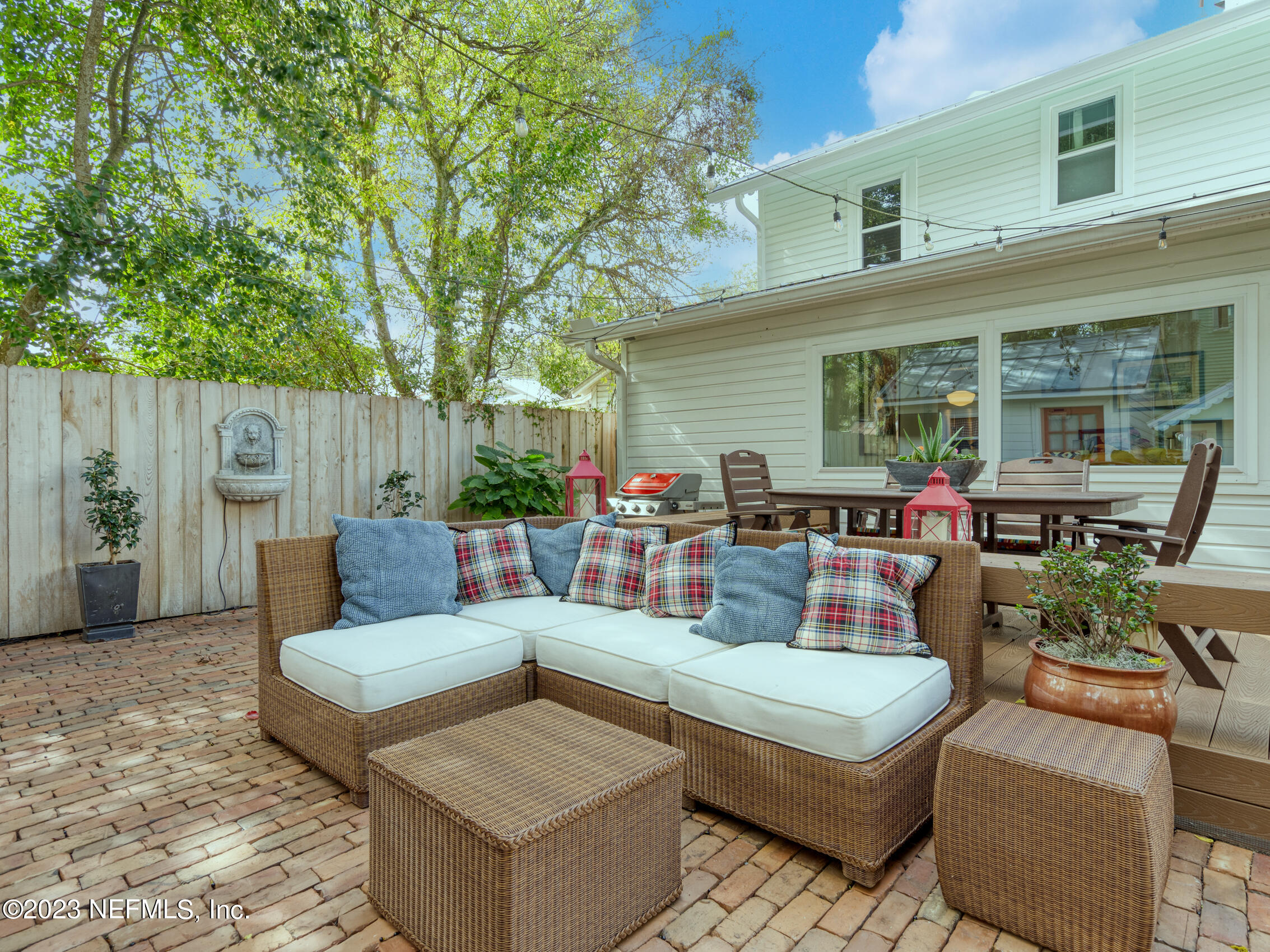 124 South 5th Street Fernandina Beach, FL 32034 - Photo 45 of 60 a outdoor living space with furniture and garden view