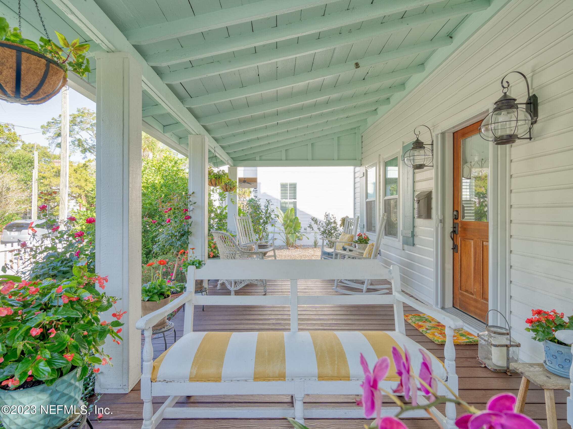 124 South 5th Street Fernandina Beach, FL 32034 - Photo 5 of 60 a room with furniture and a potted plant